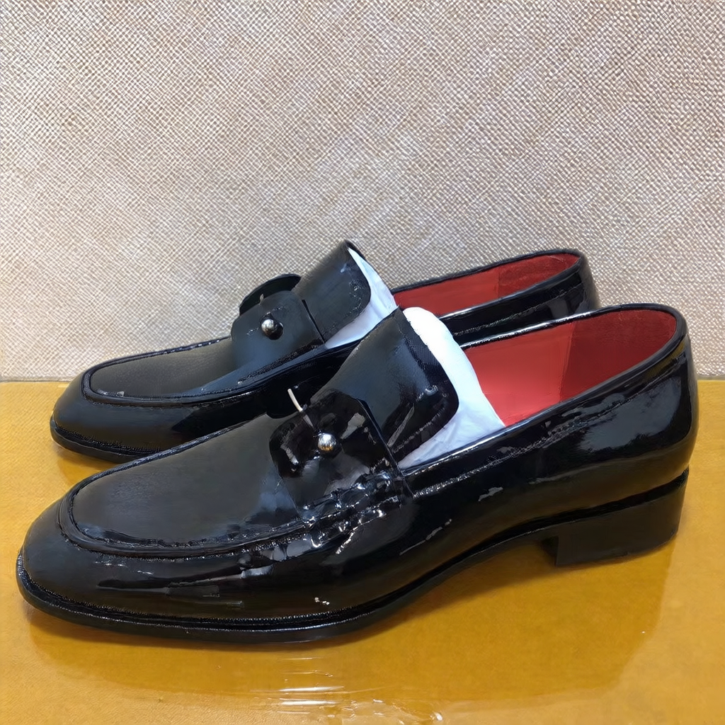 Men's black patent leather shoes with red soles